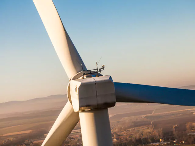 aerial view of wind turbine on a field in Poland